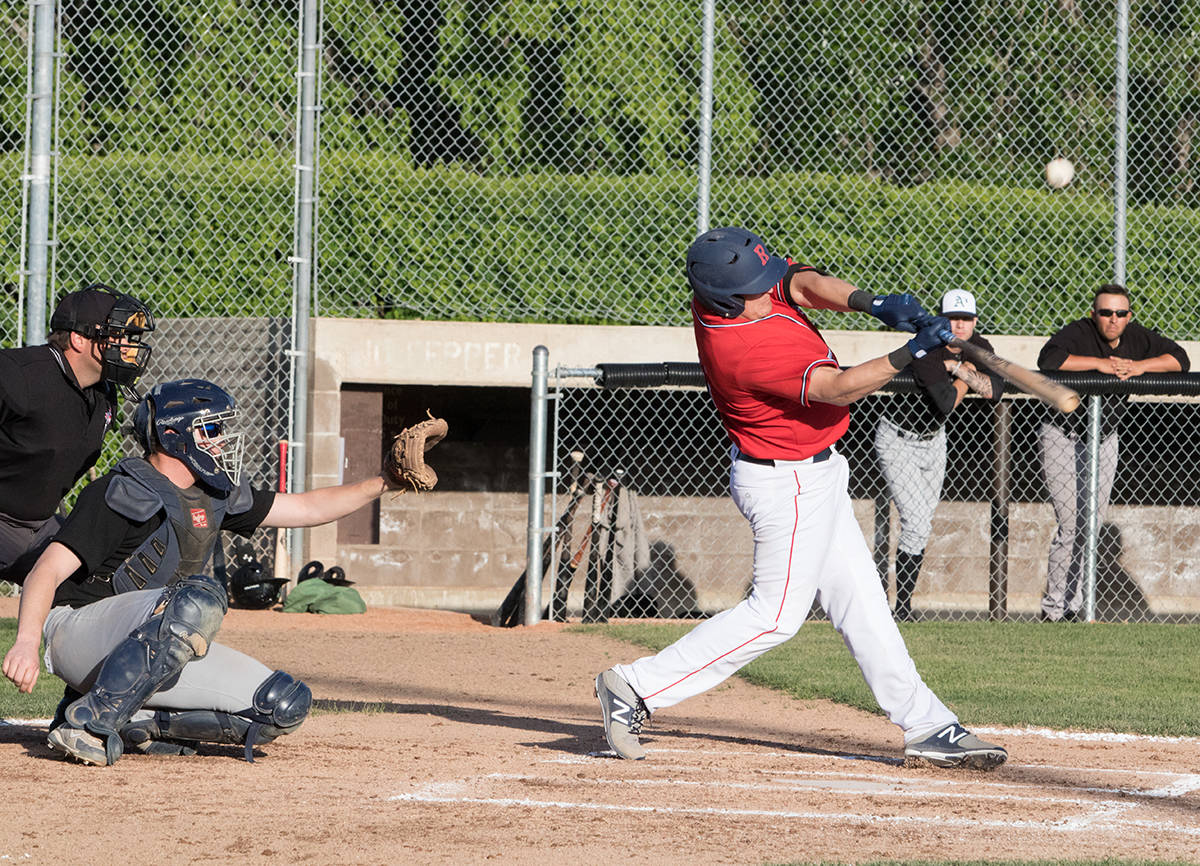 RIGGER WIN - Red Deer Rigger Jason Louis hit this basehit early in the game. Red Deer would go on to win the June 5th, 2018 affair 21-12. Todd Colin Vaughan/Red Deer Express