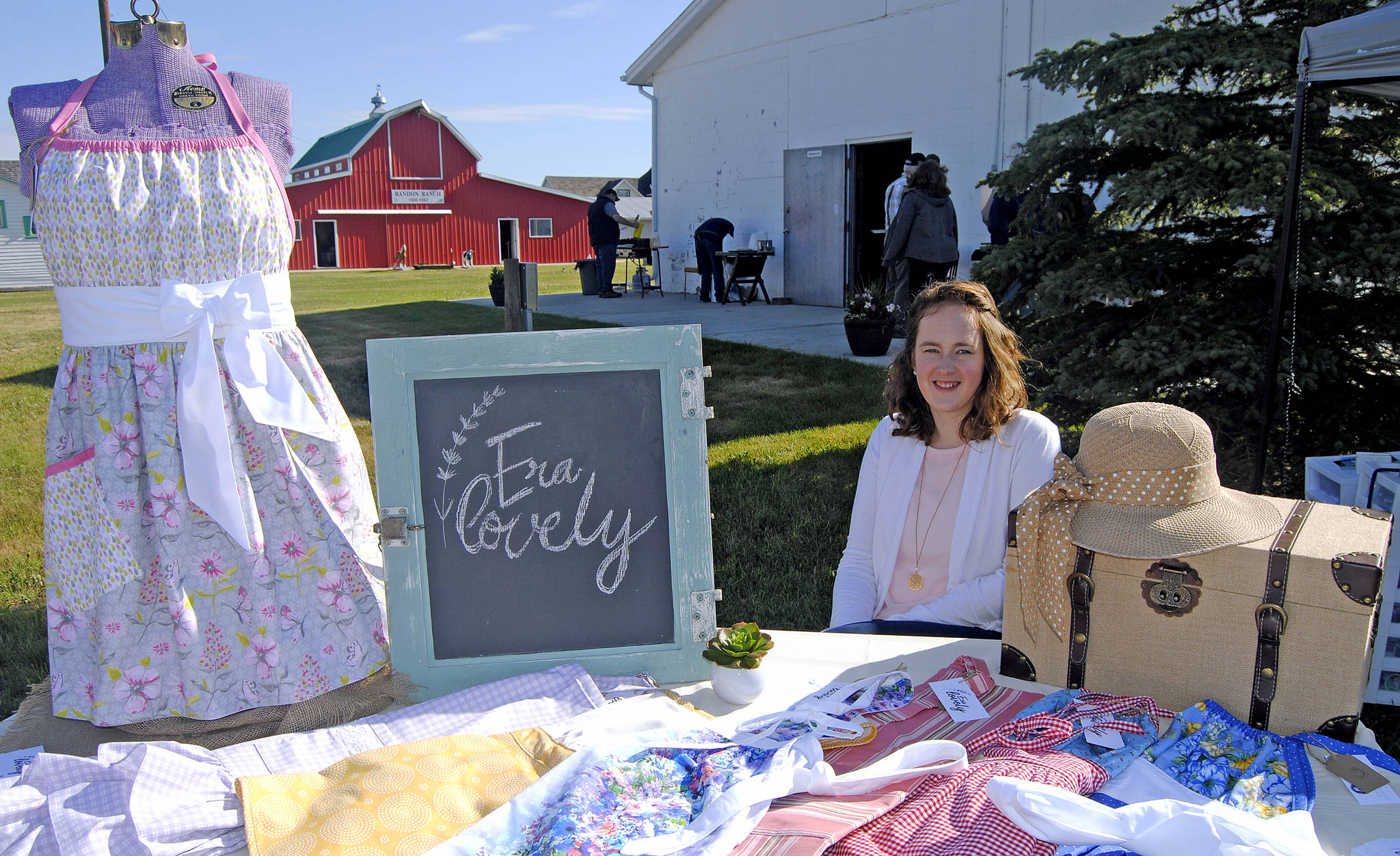 Laura Ford of Stettler with her custom and handmade aprons during Stettler Town and Country Museum’s market and pancake breakfast June 2.                                Lisa Joy/Stettler Independent