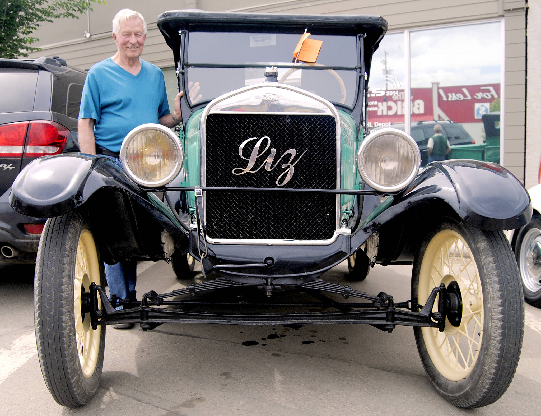 Dave McCourt of Stettler with his Tin Lizzie, 1927 Ford Model T, which he affectionately calls “Liz.” (Lisa Joy/Stettler Independent)