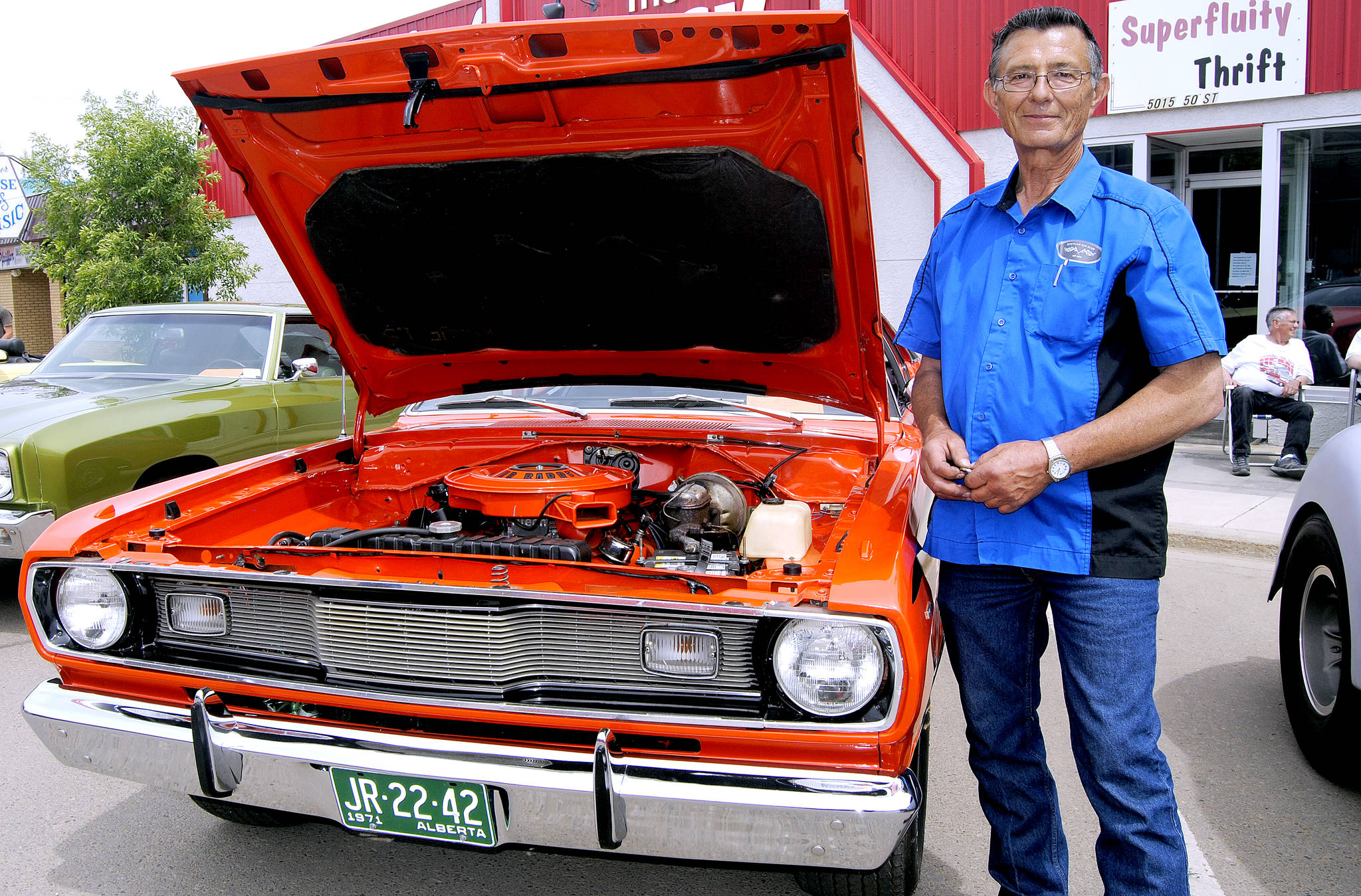 Lawrence Muhlbach of Stettler with his 1971 Plymouth Duster. (Lisa Joy/Stettler Independent)