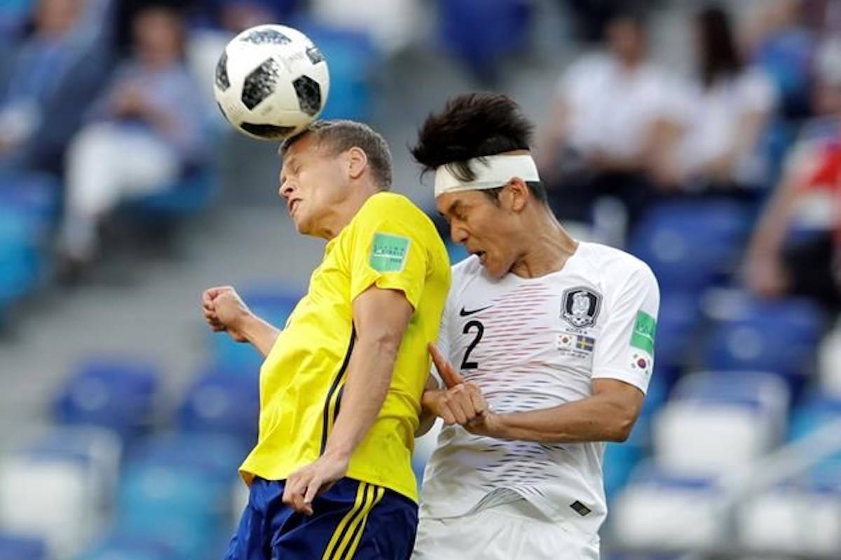 Sweden’s Viktor Claesson heads the ball past South Korea’sÂ LeeÂ Yong during the group F match between Sweden and South Korea at the 2018 soccer World Cup in the Nizhny Novgorod stadium in Nizhny Novgorod, Russia, Monday, June 18, 2018. (AP Photo/Petr David Josek)