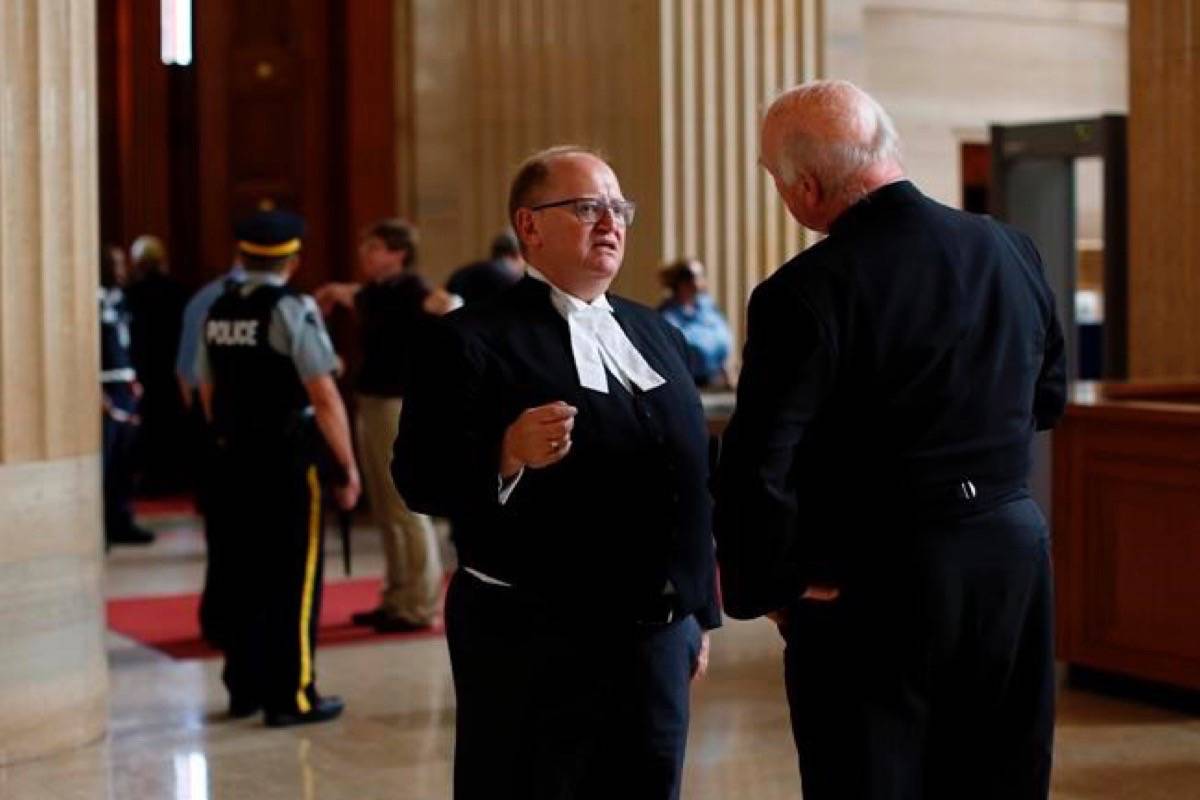 Lawyer Doug Elliott, the lead for the plaintiffs in the LGBT purge class action lawsuit, chats outside the courtroom in the Federal Court of Canada in Ottawa, on June 18, 2018. (David Kawai/The Canadian Press)