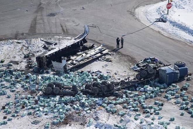 The wreckage of a fatal crash outside of Tisdale, Sask., is seen Saturday, April, 7, 2018. A retired police chief wants the coroner’s office in Saskatchewan to develop a plan for responding to mass casualties.Former Saskatoon police chief Clive Weighill says the office was tasked with creating such a plan 13 years ago but none exists. THE CANADIAN PRESS/Jonathan Hayward