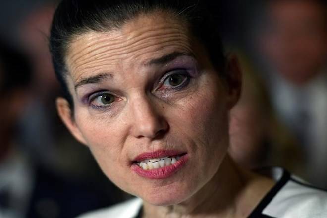 Minister of Science, Sport and Persons with Disabilities Kirsty Duncan makes an announcement on the elimination of harassment, abuse and discrimination in sport in the Foyer of the House of Commons on Parliament Hill in Ottawa on Tuesday, June 19, 2018. THE CANADIAN PRESS/Justin Tang