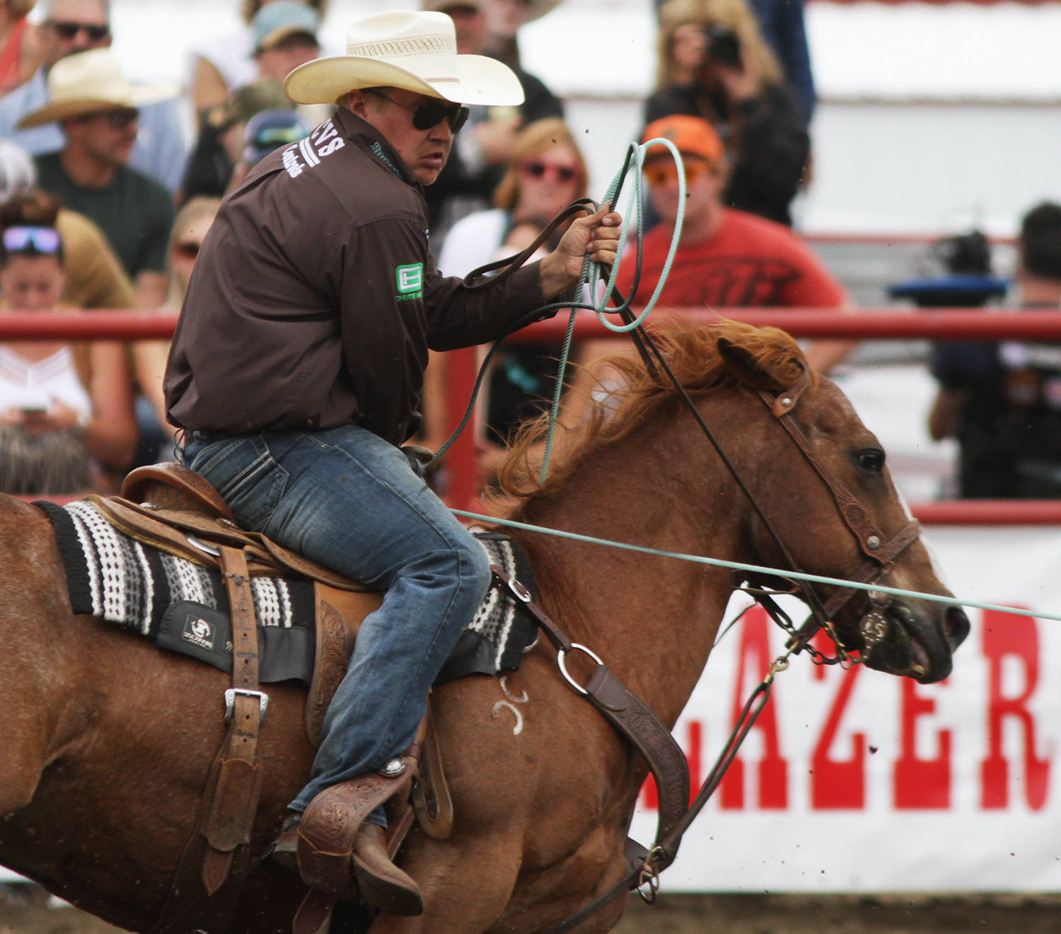 The champion team roper team of Levi Simpson and Jeremy Buhler faced some serious competition on Saturday’s performance but the pair managed to land in the sixth spot with a combined total of 14.3 seconds. Here Simpson pulls a calf towards his horse.