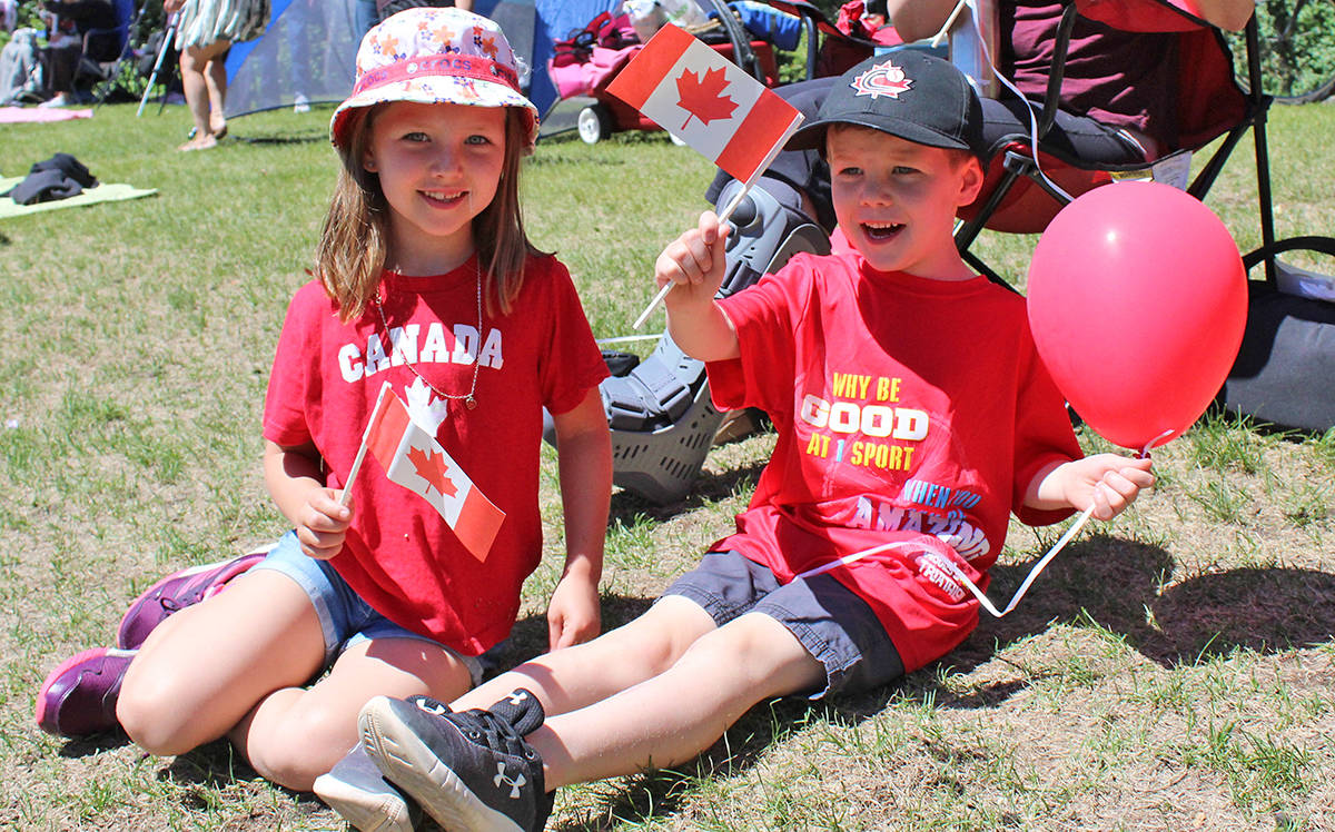 CANADIAN EH - Kate and Declan Lynch have fun celebrating Canada Day in Bower Ponds. Carlie Connolly/Red Deer Express
