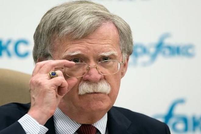 FILE - In this June 27, 2018, file photo, U.S. National security adviser John Bolton listens to question as speaks to the media after his talks with Russian President Vladimir Putin in Moscow, Russia. Bolton said Sunday, July 1, the U.S. has a plan that would lead to the dismantling of North Korea’s nuclear weapons and ballistic missile programs in a year. (AP Photo/Alexander Zemlianichenko, File)