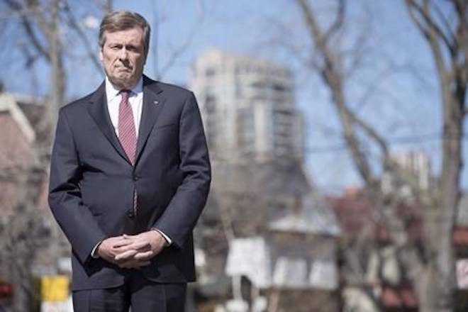Mayor John Tory stands in front of the media in Toronto on Tuesday April 18, 2017. Toronto. Tory, who was filling in as the morning show host on radio station CFRB, told listeners that shootings in Toronto involve “a very complicated network of gangs in the city.” THE CANADIAN PRESS/Chris Young