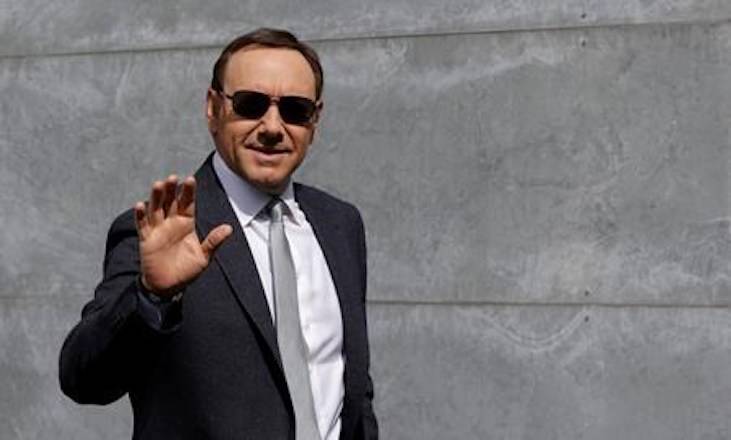 FILE - In this file photo dated Tuesday, June 21, 2016, actor Kevin Spacey waves as he arrives to attend the Giorgio Armani men’s Spring-Summer 2016-2017 fashion show in Milan, Italy. . (AP Photo/Luca Bruno, FILE)