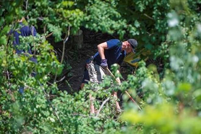 Police investigate a property along Mallory Cres. in Toronto as part of the Bruce McArthur investigation on Wednesday, July 4, 2018. THE CANADIAN PRESS/ Tijana Martin