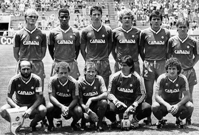 The Canadian team pose for photographers before the start of the Football World Cup match between Canada and Hungary in Irapuato, Mexico on June 6, 1986. Left to right standing; Ian Bridge, Randy Samuel, Igor Vrablic, Randy Ragan, Bob Lenarduzzi, Gerry Gray. Front row left to right; Bruce Wilson, Carl Valentine, David Norman, Tino Lettieri, Paul James. THE CANADIAN PRESS