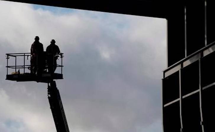 Workers are pictured at the Vancouver Shipyard in North Vancouver on October 7, 2013. THE CANADIAN PRESS/Jonathan Hayward