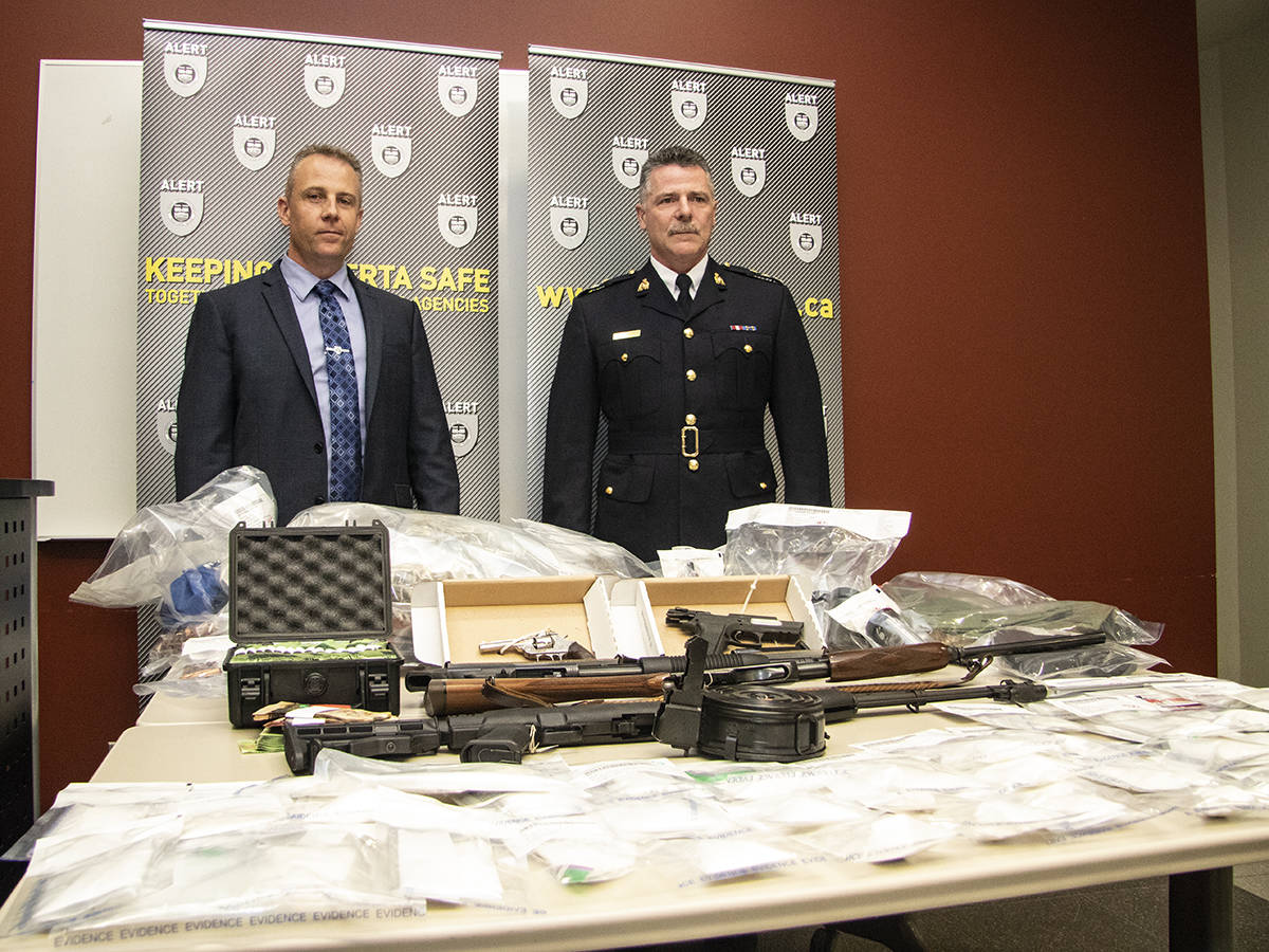 TRAFFICKING ARRESTS - ALERT CEO Chad Coles and Red Deer RCMP Superintendent Ken Foster recently held a press conference after a year long drug-trafficking investigation. Todd Colin Vaughan/Red Deer Express