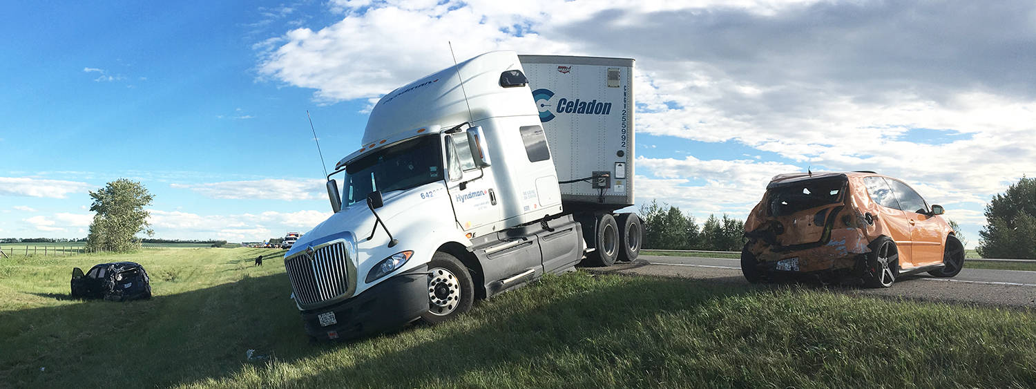 Ponoka RCMP are investigating a collision between a semi tractor and two sedans Saturday afternoon as a possible road rage incident. The semi tractor collided with the two vehicles after they stopped abruptly in the northbound lanes of Highway 2 north of Ponoka.                                Photos by Jeffrey Heyden-Kaye