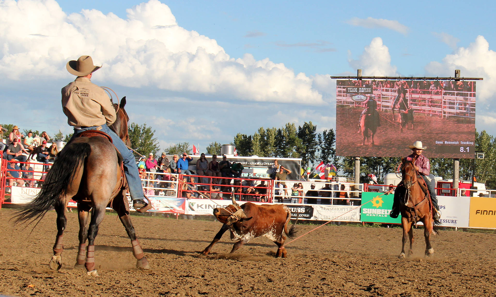 The roping team of Elliott and Denny worked together quickly to get the job done during the team roping event.