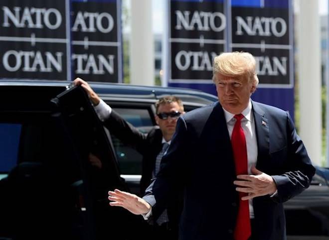 U.S. President Donald Trump arrives to the NATO Summit in Brussels, Belgium on Wednesday, July 11, 2018. THE CANADIAN PRESS/Sean Kilpatrick