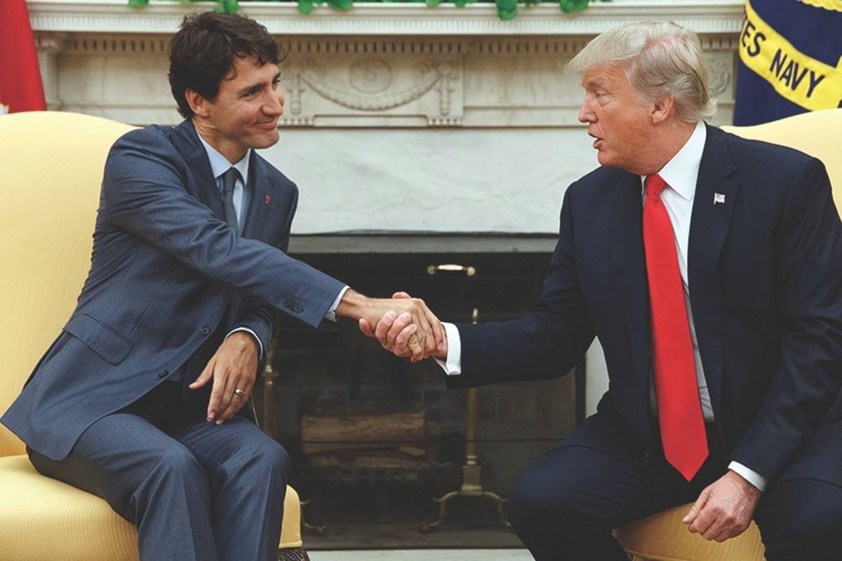 In this Oct. 11, 2017, file photo, President Donald Trump shakes hands with Canadian Prime Minister Justin Trudeau in the Oval Office of the White House. (Evan Vucci, AP Photo)