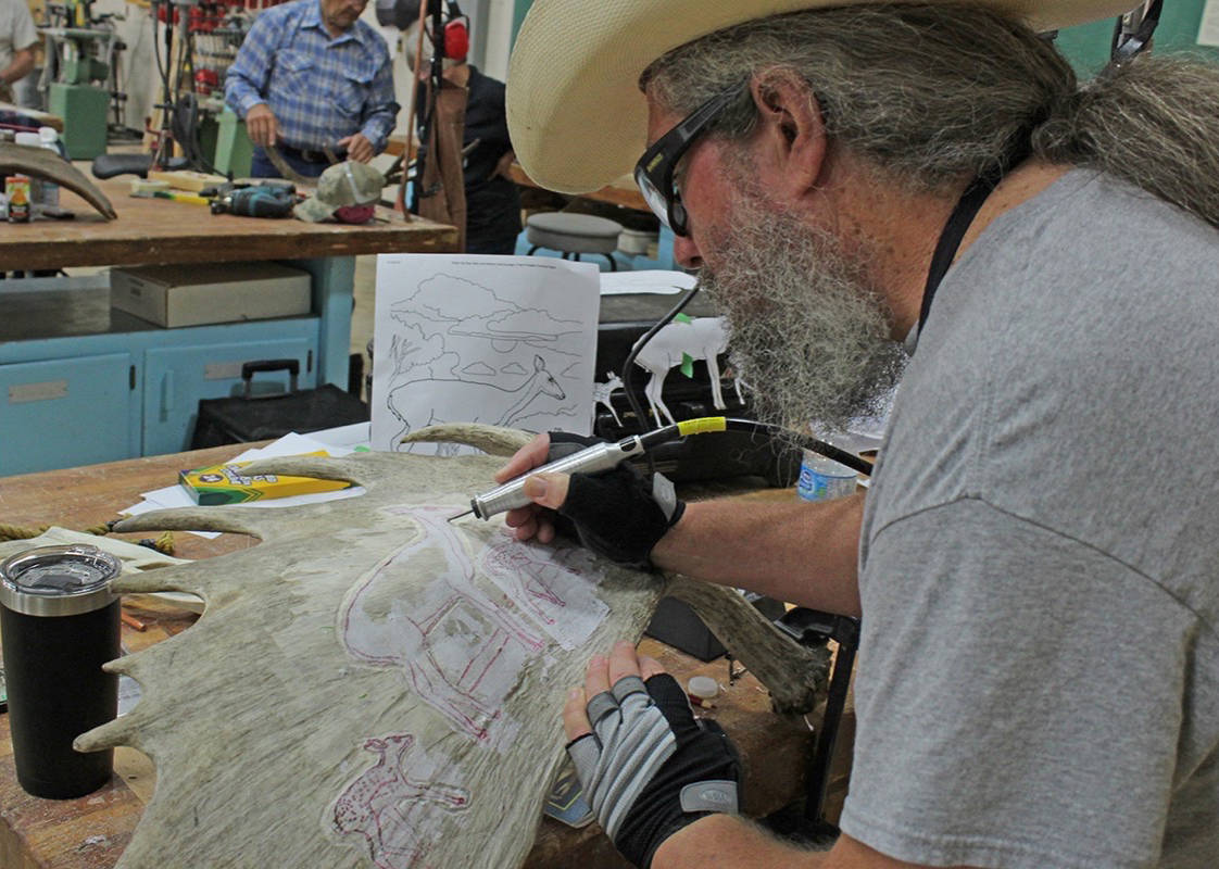 Artist Steven Havens takes part in antler carving, a course offered in Red Deer College’s Series Summer Arts School. Carlie Connolly/Red Deer Express