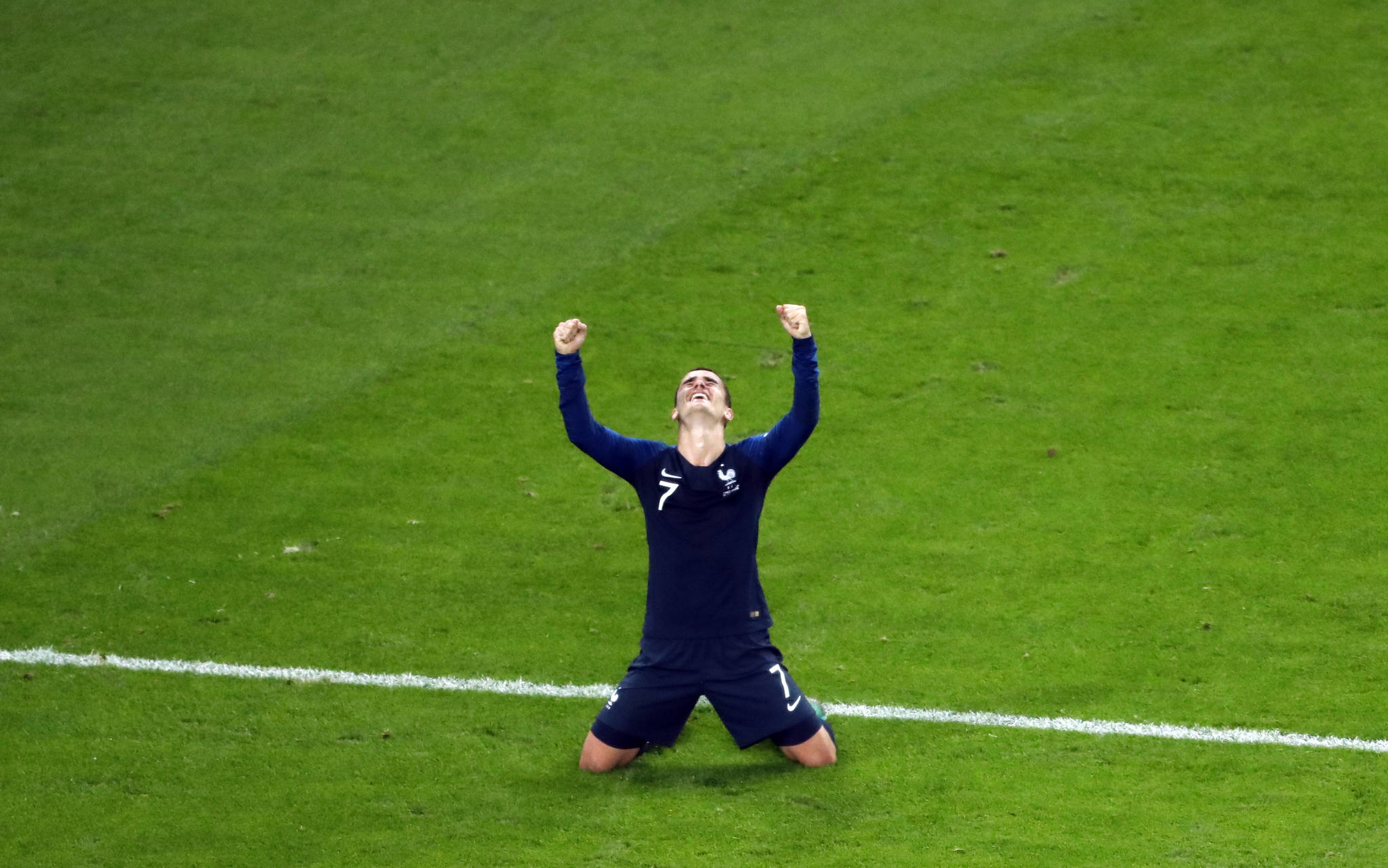 France’s Antoine Griezmann celebrates at the end of the semifinal match between France and Belgium at the 2018 soccer World Cup in the St. Petersburg Stadium in St. Petersburg, Russia, Tuesday, July 10, 2018. (AP Photo/Pavel Golovkin)