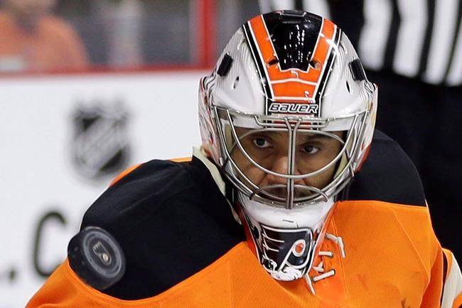 Philadelphia Flyers’ Ray Emery watches a deflected shot fly by during the first period of an NHL hockey game against the Boston Bruins, Saturday, Jan. 10, 2015, in Philadelphia. (THE CANADIAN PRESS/AP, Matt Slocum)