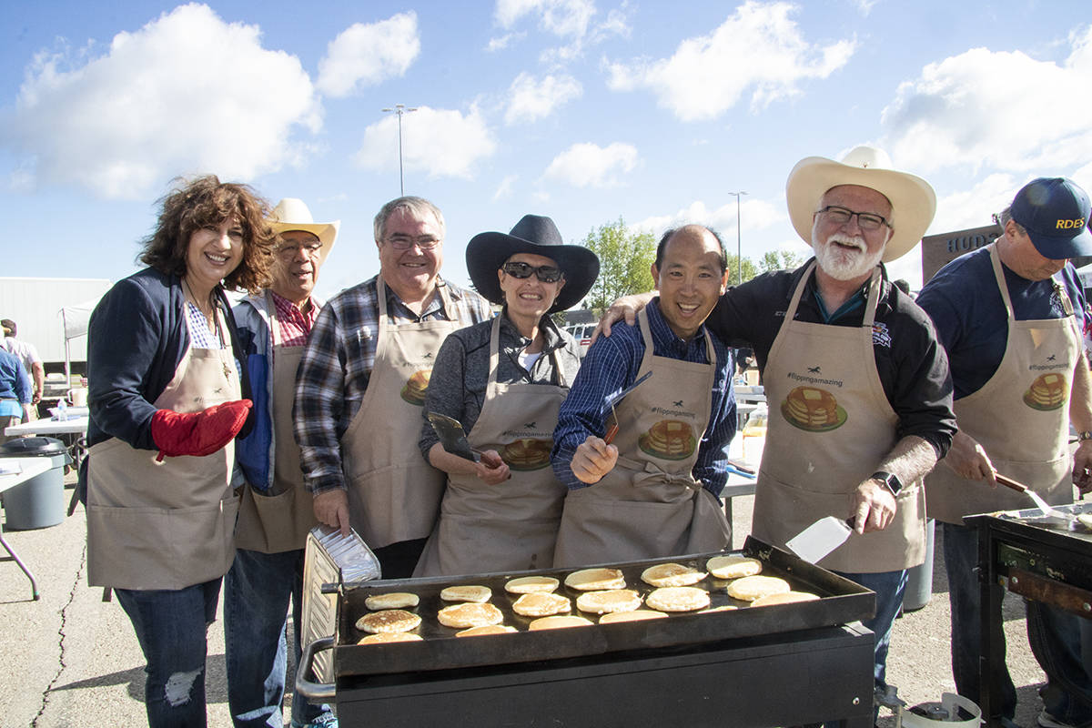 FLIPPING AMAZING - Red Deer City Council helped serve up pancakes for over 6,000 Central Albertans at the 36th annual Bower Place Pancake Breakfast.Todd Colin Vaughan/Red Deer Express