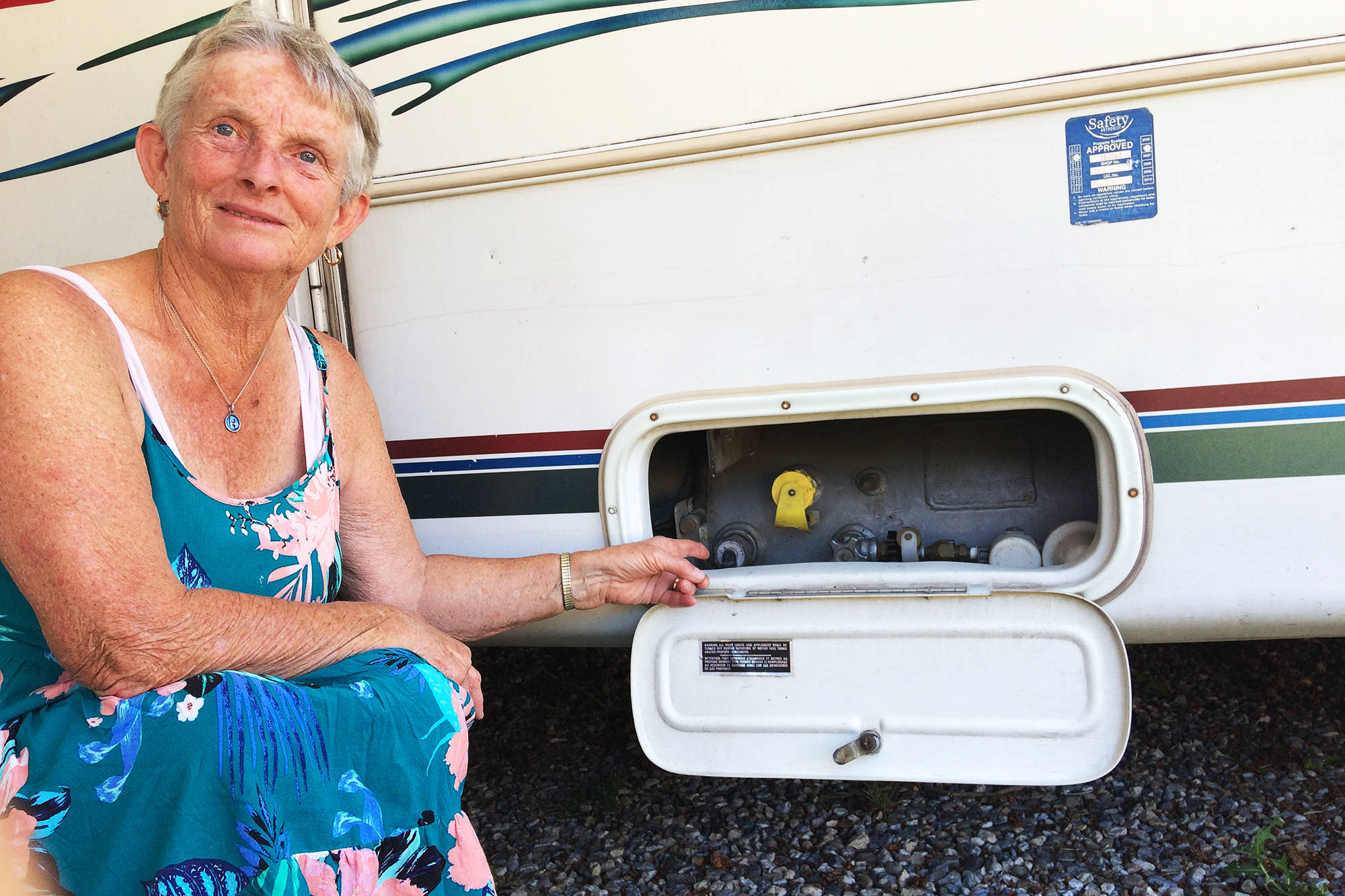 Heather Stefanek indicates the location of the propane tank on the family motorhome that an attendant at a Kamloops gas station dangerously overfilled by 50 per cent. (Photo contributed)