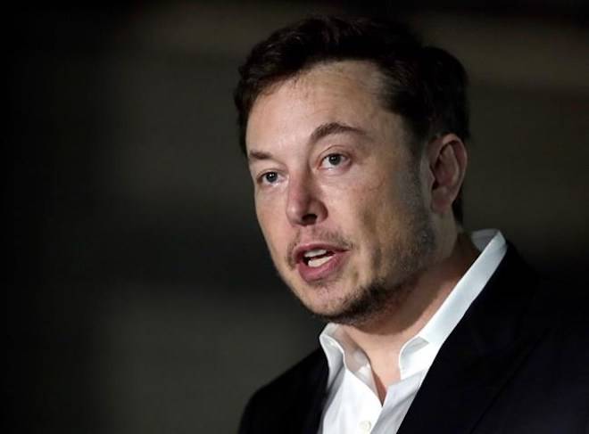 FILE - In a Thursday, June 14, 2018 file photo, Tesla CEO and founder of the Boring Company Elon Musk speaks at a news conference, in Chicago. (AP Photo/Kiichiro Sato, File)