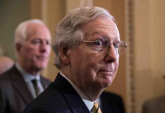 Senate Majority Leader Mitch McConnell, R-Ky., joined at left by Majority Whip John Cornyn, R-Texas, speaks to the media on Capitol Hill in Washington, Tuesday, July 17, 2018. McConnell says there is “indisputable evidence” Russia tried to affect the 2016 presidential election. He says the Senate understands the “Russia threat” and that is the “widespread view here in the United States Senate among members of both parties.” (AP Photo/J. Scott Applewhite)