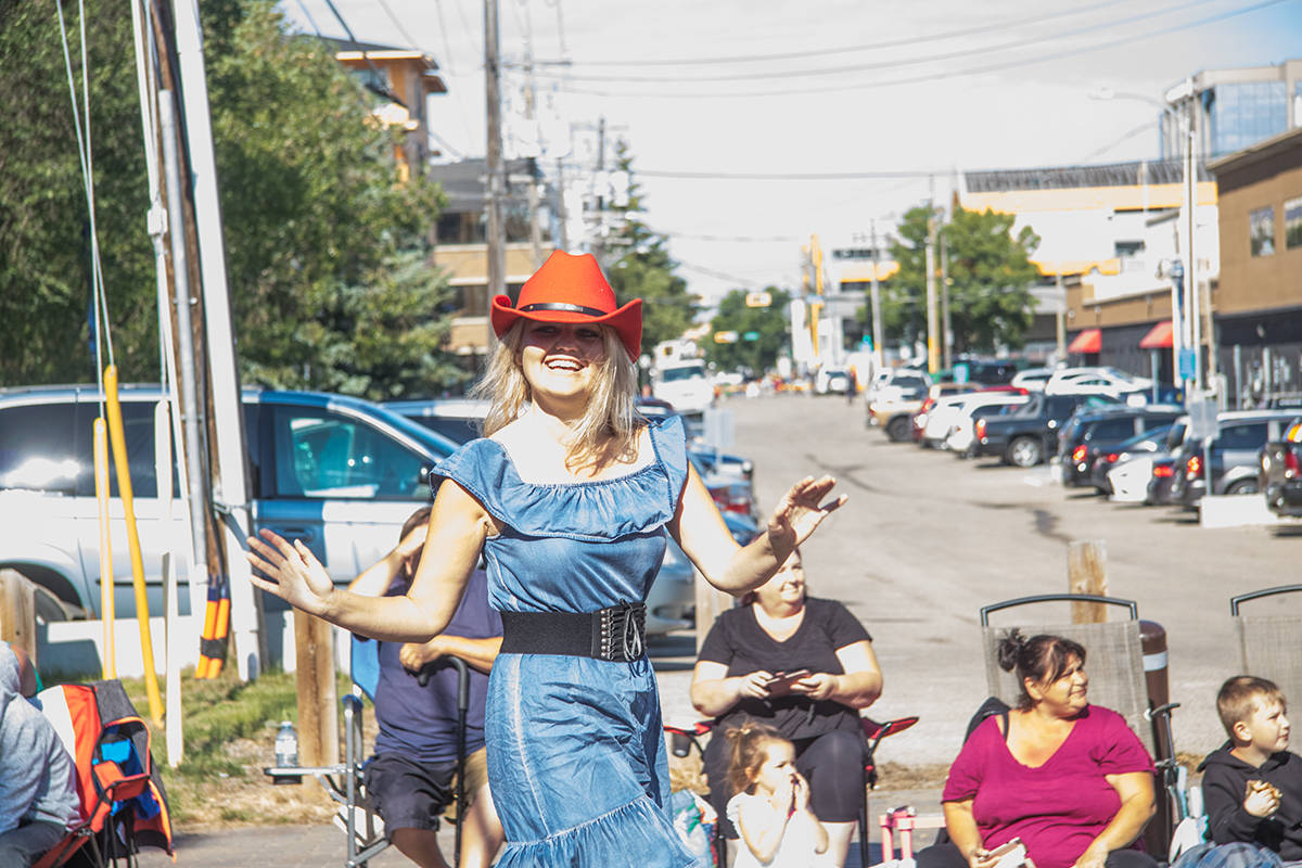 PARADE DAY - Mayor Tara Veer was waving to the thousands of Red Deerians who came out for the 2018 Westerner Days Parade. Todd Colin Vaughan/Red Deer Express