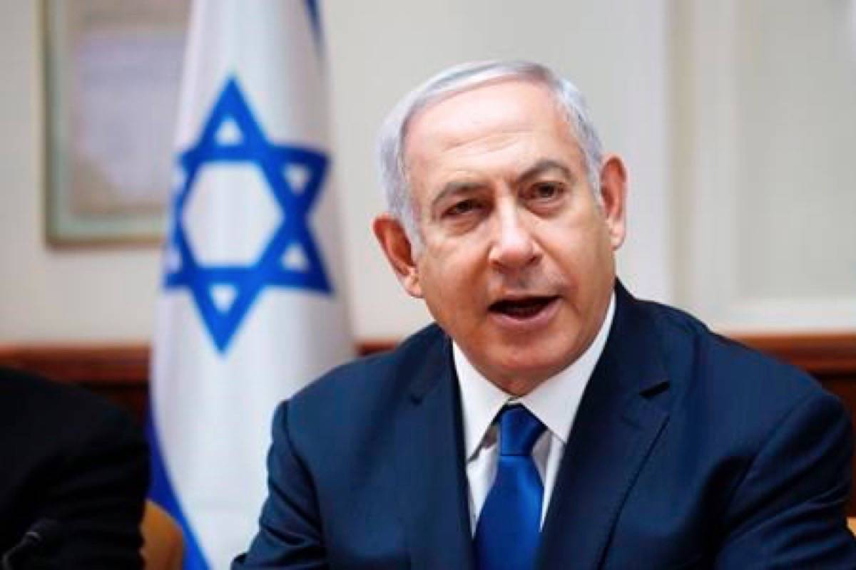 Israeli Prime Minister Benjamin Netanyahu chairs the weekly cabinet meeting at his office in Jerusalem, Sunday, July 15, 2018. Israeli Prime Minister Benjamin Netanyahu says Justin Trudeau was among those who personnally asked that Israel evacuate hundreds of so-called White Helmets from Syria amid fears they would be attacked by government troops. (THE CANADIAN PRESS/AP, Ronen Zvulun, Pool)