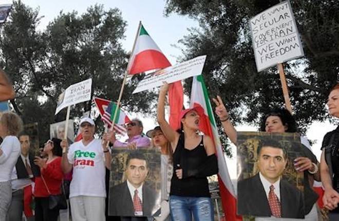Protesters against the current Iranian regime stand outside the Ronald Reagan Presidential Library and Museum where U. S. Secretary of State Mike Pompeo was speaking Sunday, July 22, 2018, in Simi Valley, Calif. (AP Photo/Mark J. Terrill)