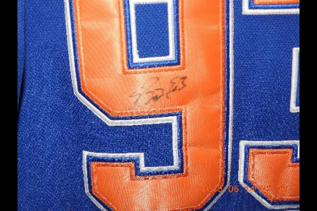 Police recover stolen signed Edmonton Oilers jersey