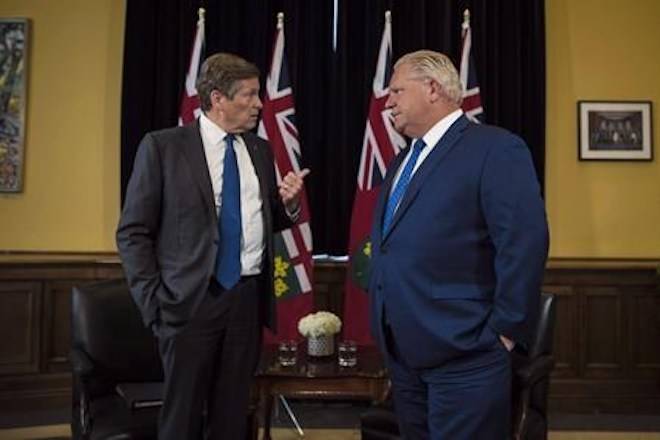 Ontario Premier Doug Ford and Toronto Mayor John Tory meet inside the Premier’s office at Queen’s Park in Toronto on Monday, July 9, 2018. THE CANADIAN PRESS/Tijana Martin