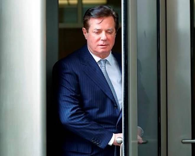 FILE - In this Feb. 14, 2018, file photo, Paul Manafort leaves the federal courthouse in Washington. (AP Photo/Pablo Martinez Monsivais, File)