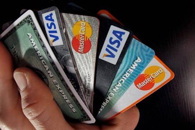 Consumer credit cards are posed in North Andover, Mass. on March 5, 2012. THE CANADIAN PRES