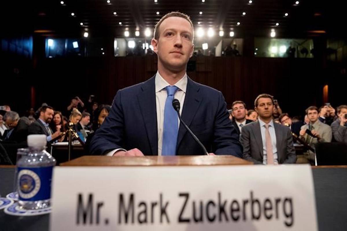 FILE - In this April 10, 2018 file photo, Facebook CEO Mark Zuckerberg arrives to testify before a joint hearing of the Commerce and Judiciary Committees on Capitol Hill in Washington about the use of Facebook data to target American voters in the 2016 election. (AP Photo/Andrew Harnik)