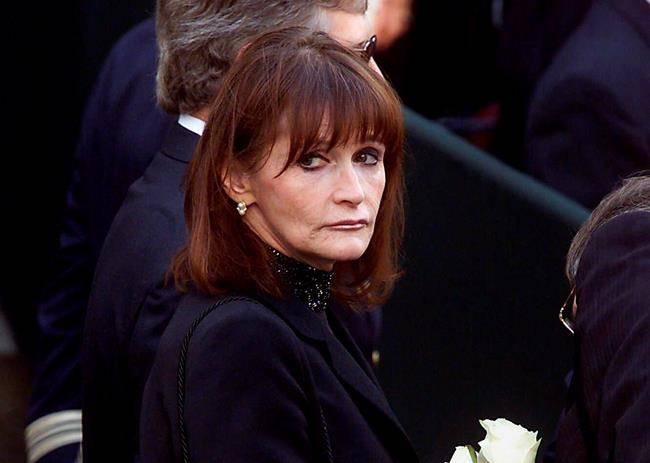 FILE - In this Oct. 3, 2000 file photo, actress Margot Kidder, who dated former Prime Minister Pierre Trudeau, arrives for his funeral at Notre-Dame Basilica in Montreal. (Adrian Wyld/The Canadian Press via AP, File)