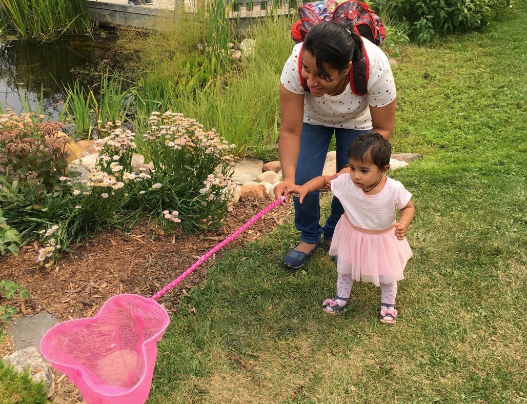 Shany George and her daughter Esther, one, of Calgary, enjoyed a fun, activity-filled afternoon Aug. 11th at the annual Bug Jamboree hosted by the Ellis Bird Farm.                                Mark Weber/Red Deer Express