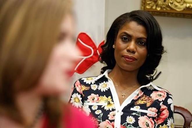 FILE - In this Feb. 14, 2017, file photo, Omarosa Manigault-Newman, then an aide to President Donald Trump, watches during a meeting with parents and teachers in the Roosevelt Room of the White House in Washington. The White House is slamming a new book by ex-staffer Omarosa Manigault-Newman, calling her ‚Äúa disgruntled former White House employee.‚Äù (AP Photo/Evan Vucci, File)