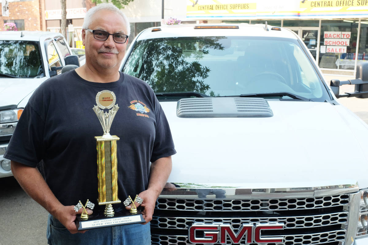 Ponoka’s Bob Ronnie holds up his trophy from Aug. 15’s Hot August Night races at the Castrol Raceways. Ronnie has been racing his 1968 Chevrolet Camaro for some years now, which can hit speeds up to 140 miles per hour in a quarter mile.
