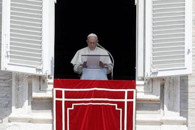 FILE - In this Sunday, Aug. 19, 2018 file photo, Pope Francis prays for the victims of the Kerala floods during the Angelus noon prayer in St.Peter’s Square, at the Vatican. P(AP Photo/Gregorio Borgia, File)