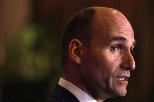 Social Development Minister Jean-Yves Duclos speaks to media following discussions about key housing priorities at the Hotel Grand Pacific in Victoria on Tuesday, June 28, 2016. (THE CANADIAN PRESS/Chad Hipolito/File)