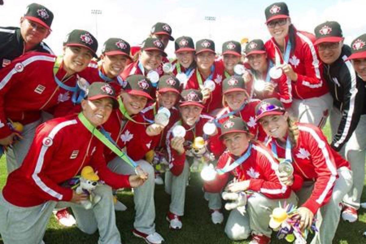 Team Canada poses poses with their silver medals after they lost to the United States in women’s baseball at the Pan Am Games in Ajax, Ont., on July 26, 2015. Canada opens play Wednesday at the women’s World Cup in Viera, Fla. The successful women’s program has five medals from eight World Cups since the biennial tournament began in 2004. But they have yet to win gold. (Fred Thornhill/The Canadian Press)