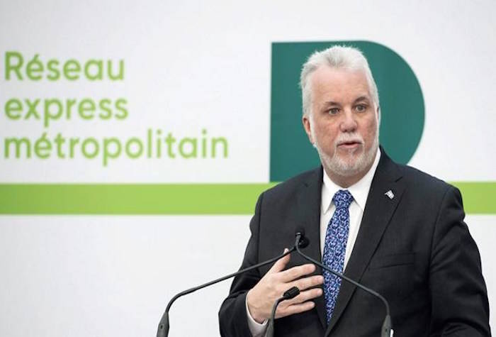 Quebec Premier Philippe Couillard speaks during a news conference in Montreal, Thusday, February 8, 2018, where he announced details of new automated light rail system for the Montreal region. A nascent federal agency designed to find new ways to finance construction of transit systems is making its first investment in a multi-billion-dollar electric rail system in Montreal. THE CANADIAN PRESS/Graham Hughes