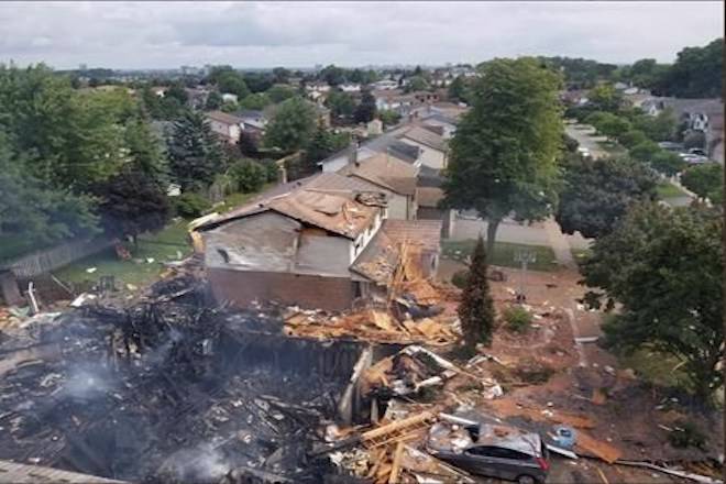 Debris is shown following a house explosion in Kitchener, Ont., on Wednesday, Aug. 22, 2018. THE CANADIAN PRESS/HO - Kitchener Fire Department