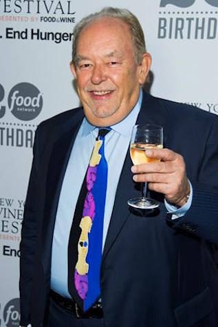 In this Oct. 17, 2013 file photo, Robin Leach attends the Food Network’s 20th birthday party in New York. Leach, whose voice crystalized the opulent 1980s on TV’s “Lifestyles of the Rich and Famous,” has died, Friday, Aug. 24, 2018. (Photo by Charles Sykes/Invision/AP, File)