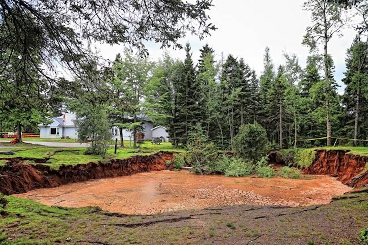 Fast-expanding Nova Scotia sinkhole sucks up trees