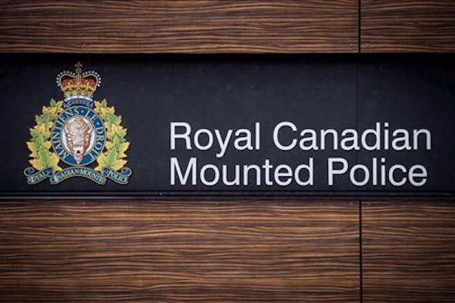 The RCMP logo is seen outside Royal Canadian Mounted Police “E” Division Headquarters, in Surrey, B.C., on Friday April 13, 2018. THE CANADIAN PRESS/Darryl Dyck