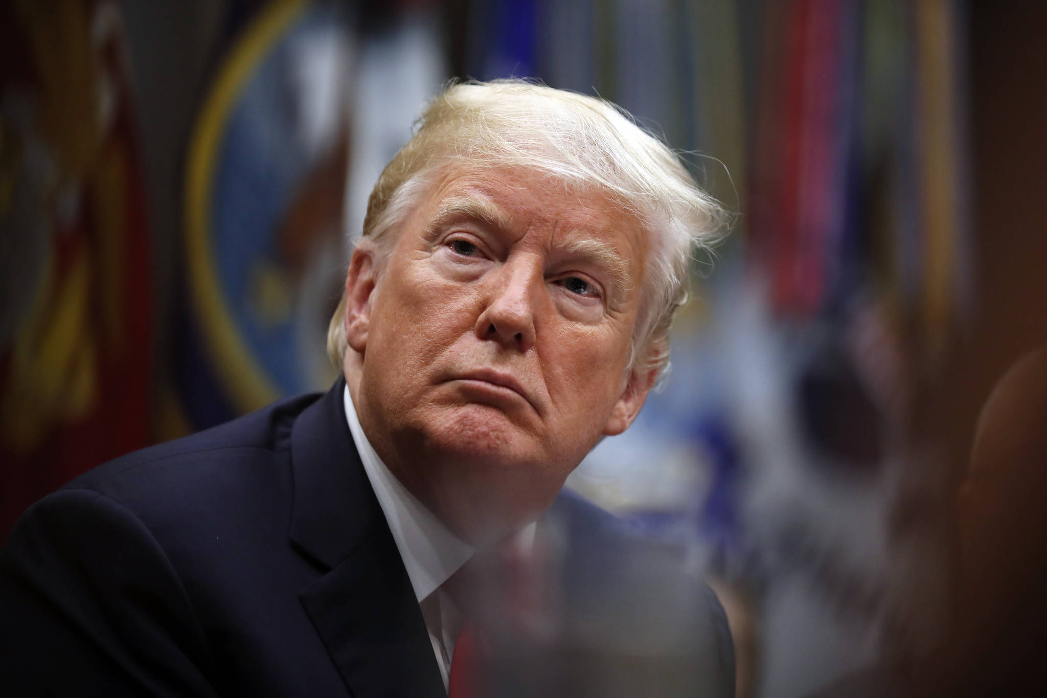 President Donald Trump listens during a discussion for drug-free communities support programs, in the Roosevelt Room of the White House, Wednesday, Aug. 29, 2018, in Washington. (AP Photo/Alex Brandon)