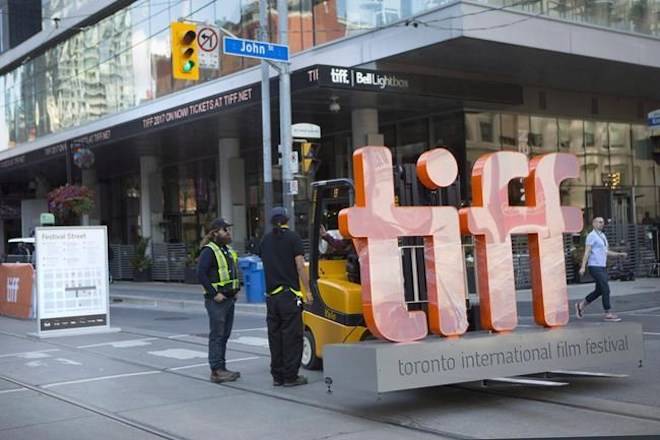 A sign bearing the Toronto International Film Festival logo sits on a fork lift as preparations are made for the festival’s opening night on September 7, 2017. THE CANADIAN PRESS/Chris Young